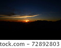 Early morning sunrise above mountains. 72892803