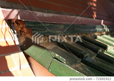 Roof tiles that need repair Roof tiles that need repair 72892922