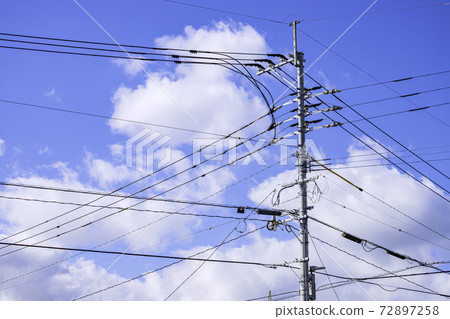 Refreshing sky and electric wires 72897258