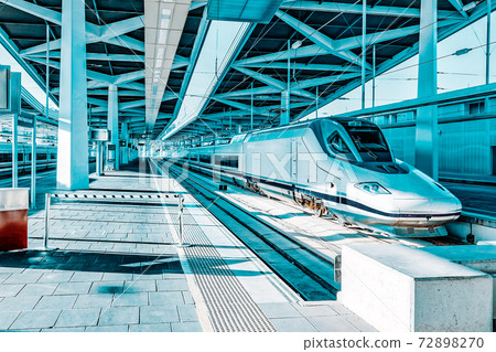 Modern high speed train at the railways stantion. Modern high speed train at the railways stantion. 72898270