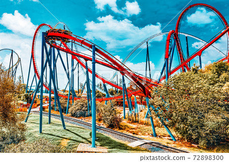 Roller Coaster in funny amusement park Roller Coaster in funny amusement park 72898300