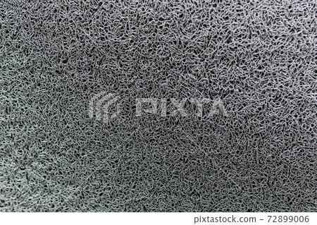 gray plastic fiber carpet or doormat for background and texture 72899006
