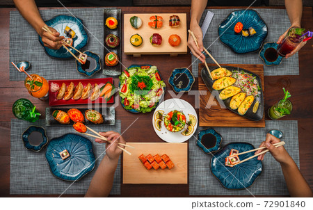 Top angle shot of a table with Japanese cuisine: inari sushi set 72901840