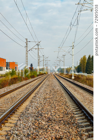 Two lane railroad with electric power lines Two lane railroad with electric power lines 72905038
