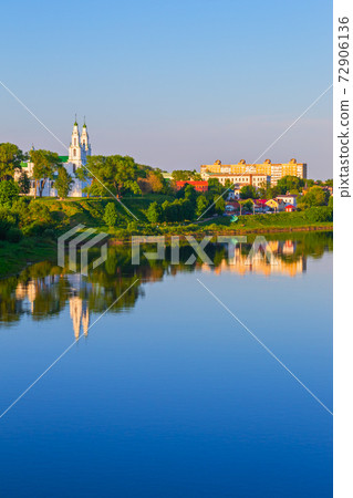 Bright evening view of the city of Polotsk across the Western Dvina, including the Sophia Cathedral, Belarus Bright evening view of the city of Polotsk across the Western Dvina, including the Sophia Cathedral, Belarus 72906136