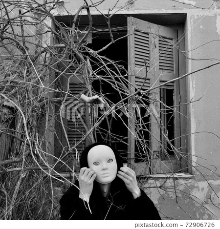 masked figure and overgrown plants masked figure and overgrown plants 72906726