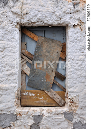 old boarded up window frame background 72906839