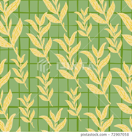Random seamless pattern with pale yellow leaf branches ornament on green chequered background. 72907058