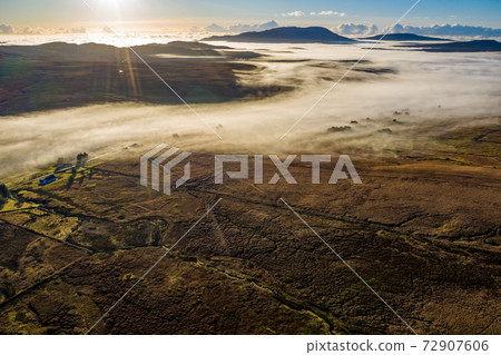 Donegal covered with fog from Crove upper to Teelin - Ireland 72907606