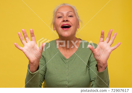 Senior caucasian woman is happy and shows ten fingers. 72907617