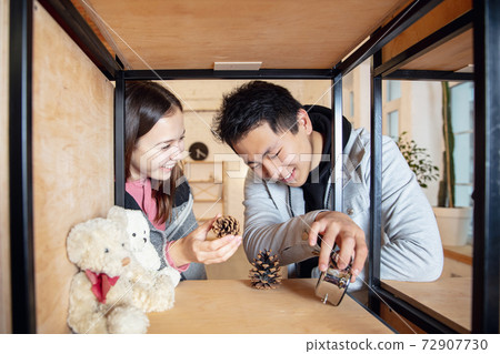 New property owners, young couple moving to new home, apartment, look happy 72907730