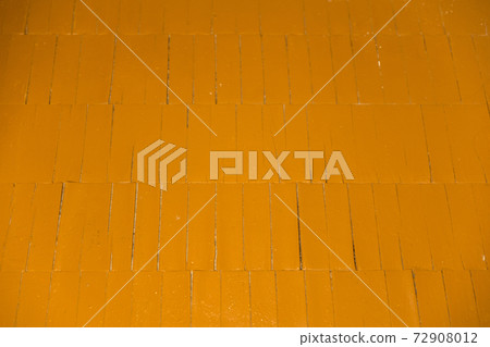Old floor parquet painted in brown colour, large gaps between the boards. 72908012