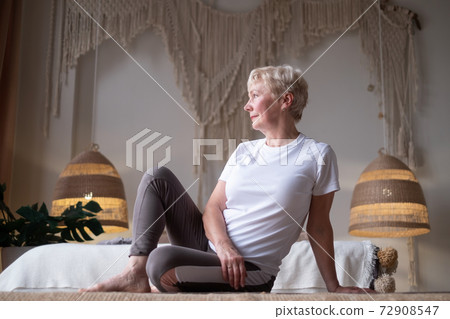 Woman resting in silence, meditating, visualizing future, enjoying weekend leisure time Woman resting in silence, meditating, visualizing future, enjoying weekend leisure time 72908547