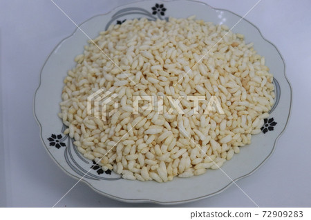 tasty and healthy puffed rice stock on plate 72909283