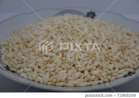 tasty and healthy puffed rice stock on plate 72909289