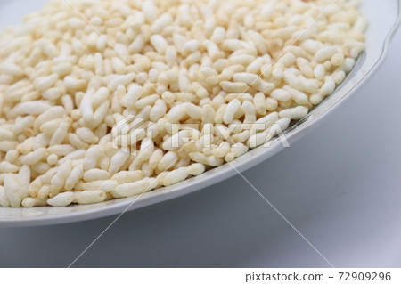 tasty and healthy puffed rice stock on plate 72909296