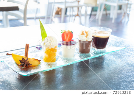 Gourmet coffee served on a plate with glassware Gourmet coffee served on a plate with glassware 72913258