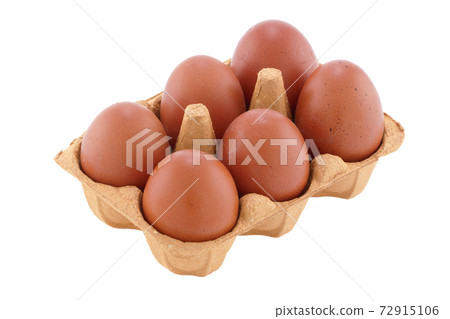 six brown eggs in carton on white with clipping path 72915106