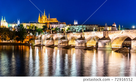 Prague night panorama. Prague Castle and Charles Bridge above Vltava River, Praha, Czech Republic 72916552