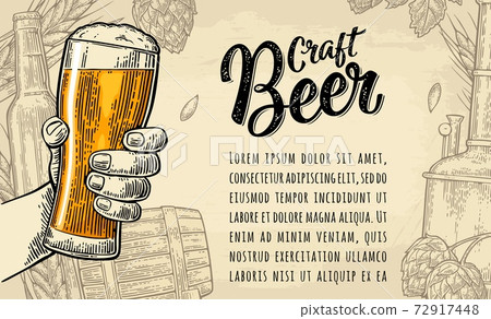 Male hand holding beer glass. Craft Beer calligraphic lettering 72917448