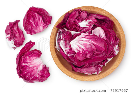 Fresh red radicchio salad in wooden bowl isolated on white background with clipping path and full depth of field. Top view. Flat lay Fresh red radicchio salad in wooden bowl isolated on white background with clipping path and full depth of field. Top view. Flat lay 72917967