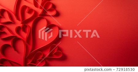 Top view of red paper hearts on red paper background with copy space. Love and Valentine's day concept. Top view of red paper hearts on red paper background with copy space. Love and Valentine's day concept. 72918530