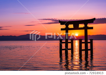 Late autumn Lake Biwa Shirahige Shrine Asahi rising from Otorii Late autumn Lake Biwa Shirahige Shrine Asahi rising from Otorii 72918913