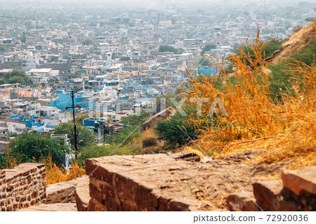 Panoramic view of blue city Jodhpur from Mehrangarh Fort road in India Panoramic view of blue city Jodhpur from Mehrangarh Fort road in India 72920036