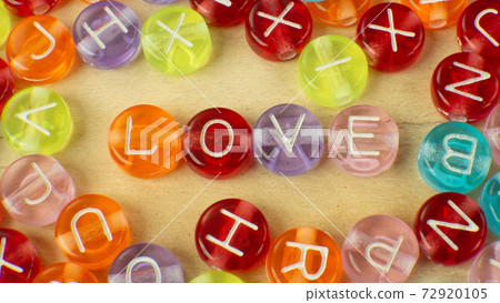 The love word on alphabet bead multi color for background content 72920105