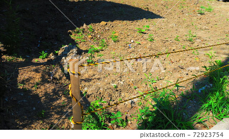 Scenery of a vacant lot with a rope Scenery of a vacant lot with a rope 72923754