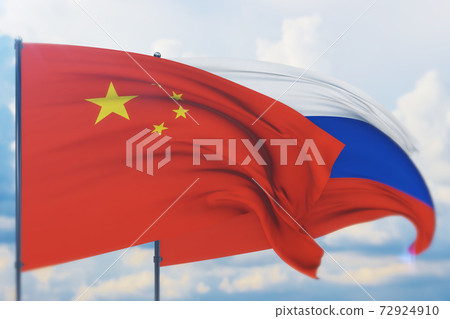 Waving Russian flag and flag of China. Closeup view, 3D illustration. 72924910