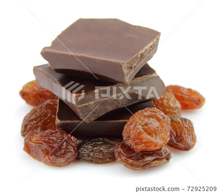 Chocolate with raisin on white backgrounds Chocolate with raisin on white backgrounds 72925209