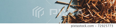 Matches on blue paper background. Top view photo. Matches on blue paper background. Top view photo. 72925773