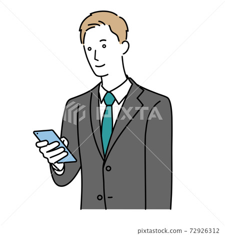 A man in a suit operating a smartphone 72926312