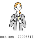 A woman in a suit operating a smartphone facing the front 72926315