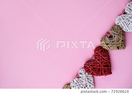 Valentine hearts on pink background with copy space. Symbols of love in shape of heart for Happy Valentine's , Women's, Mother's Day, birthday. Valentine hearts on pink background with copy space. Symbols of love in shape of heart for Happy Valentine's , Women's, Mother's Day, birthday. 72926628