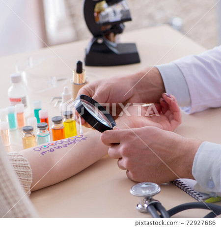 Doctor testing allergy reaction of patient in hospital Doctor testing allergy reaction of patient in hospital 72927686