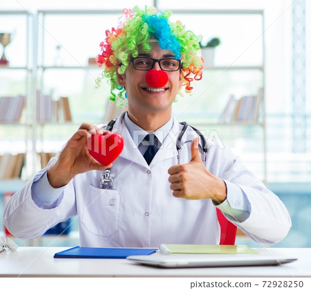 Child cardiologist with stethoscope and red heart Child cardiologist with stethoscope and red heart 72928250