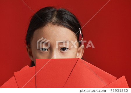 Girl With Bunch Of Red Envelopes Girl With Bunch Of Red Envelopes 72931280