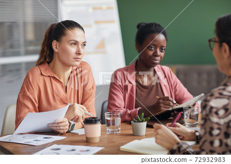 Team of Women in Meeting 72932983