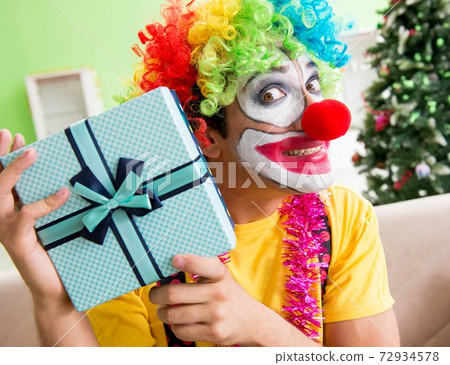 Funny clown in Christmas celebration concept 72934578