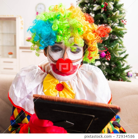 Funny clown in Christmas celebration concept 72934586