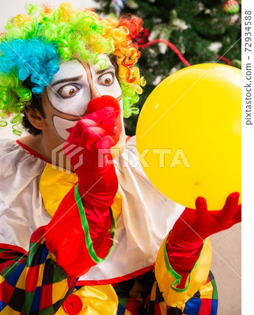 Funny clown in Christmas celebration concept 72934588