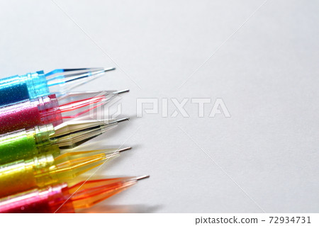 Nib of a colorful ballpoint pen with glitter 72934731