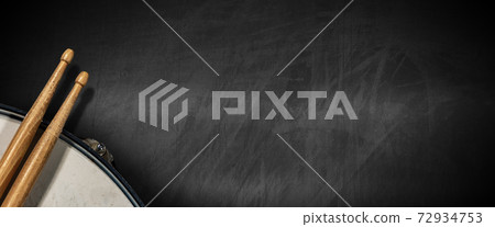 Drumsticks and Snare Drum on empty Blackboard - Percussion instrument Drumsticks and Snare Drum on empty Blackboard - Percussion instrument 72934753