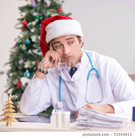 Doctor on the shift on christmas eve 72934913