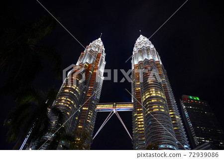 The Petronas Towers, also known as the Petronas Twin Towers The Petronas Towers, also known as the Petronas Twin Towers 72939086