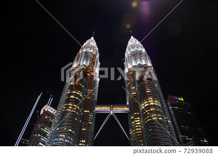 The Petronas Towers, also known as the Petronas Twin Towers The Petronas Towers, also known as the Petronas Twin Towers 72939088