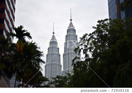 The Petronas Towers, also known as the Petronas Twin Towers The Petronas Towers, also known as the Petronas Twin Towers 72939138