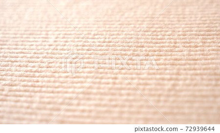 fabric as background. 4k, slow motion, beige knitted fabric 72939644